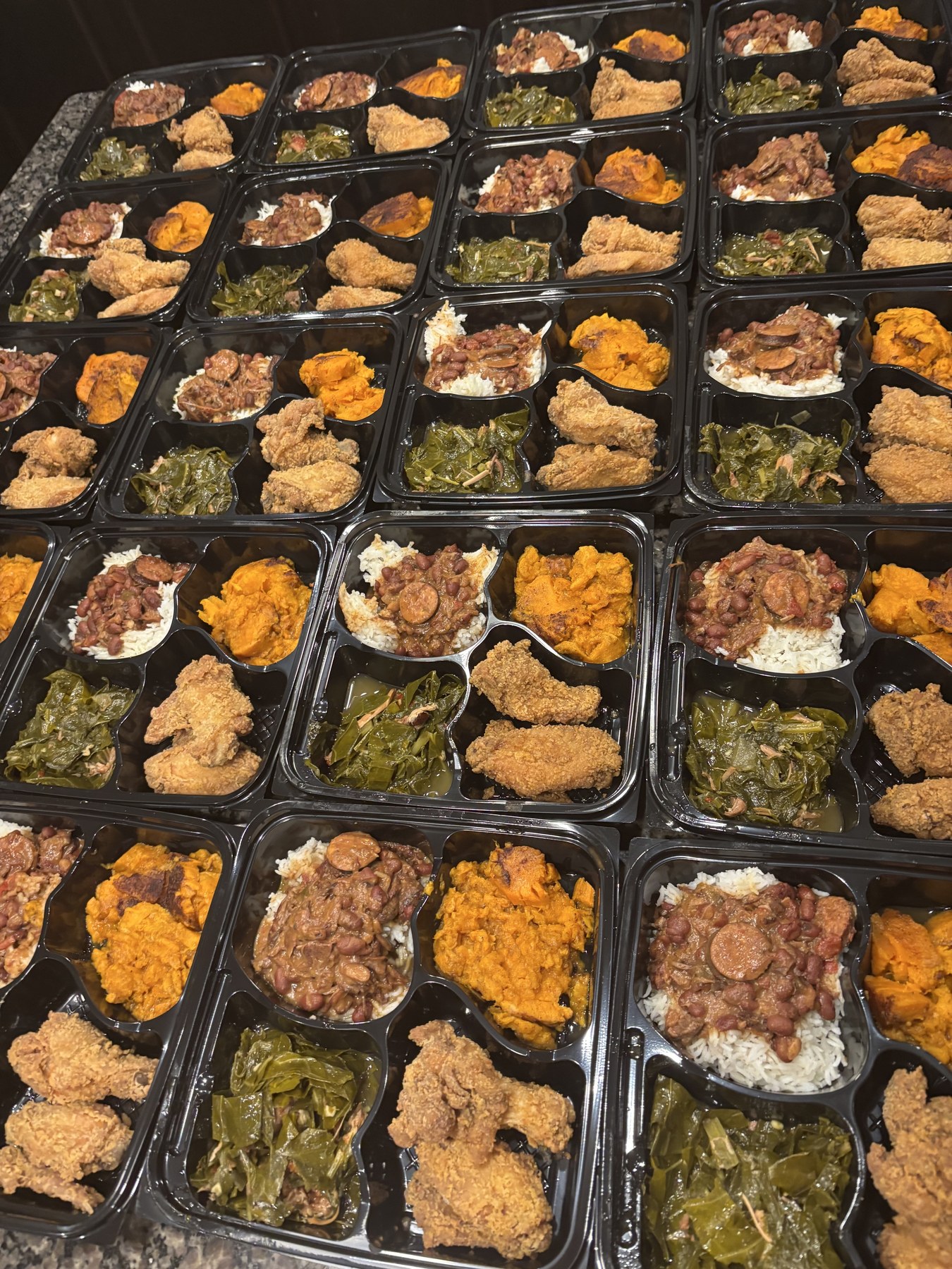 A large collection of beautifully packaged Southern comfort meals prepared by Chef Nic